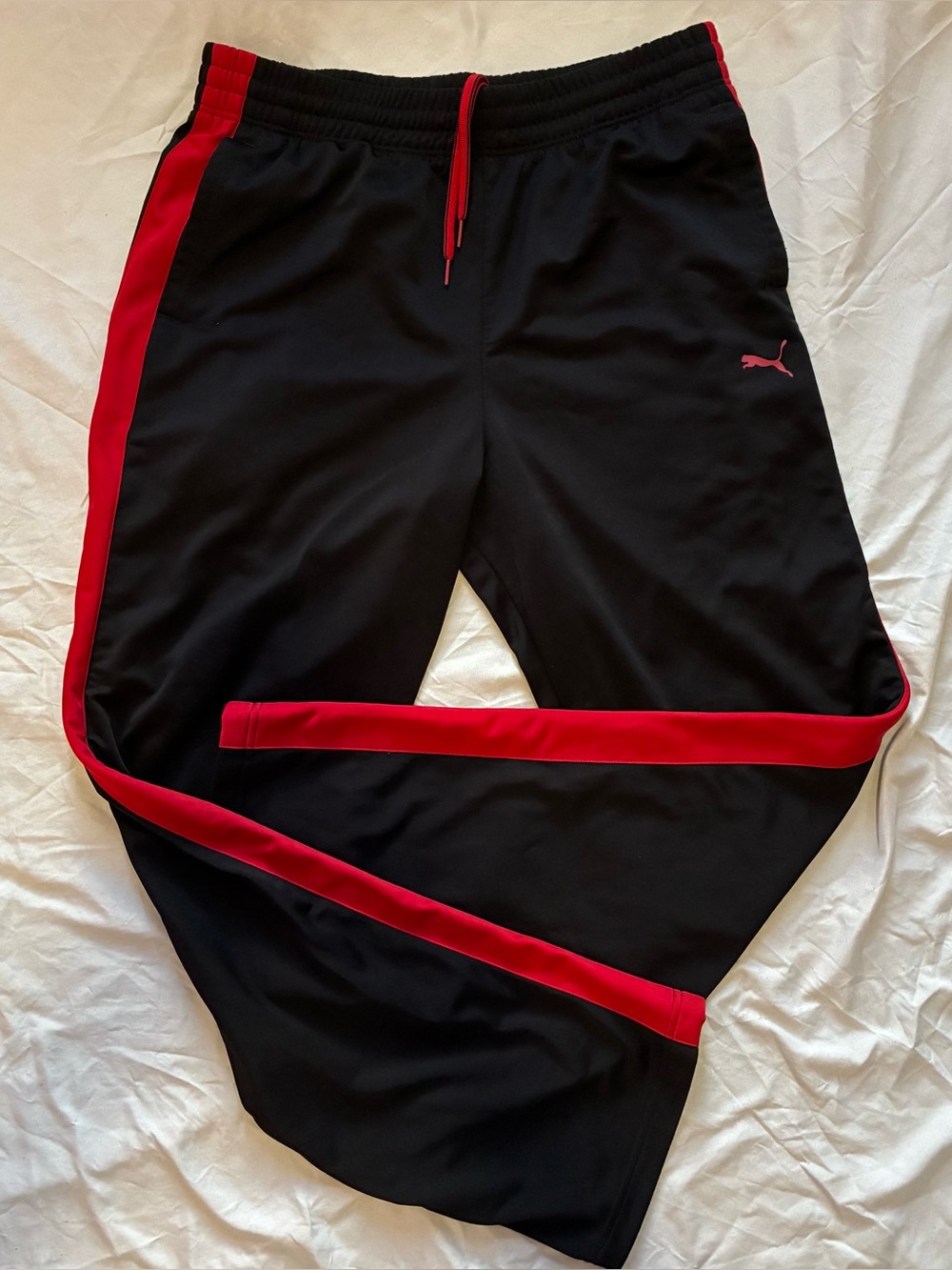Puma Black Track Pants with Red Stripe Accents